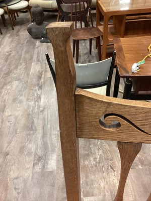 Lot 463 - IN THE MANNER OF C.F.A. VOYSEY, SET OF EIGHT ARTS & CRAFTS OAK DINING CHAIRS