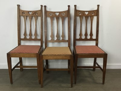 Lot 463 - IN THE MANNER OF C.F.A. VOYSEY, SET OF EIGHT ARTS & CRAFTS OAK DINING CHAIRS