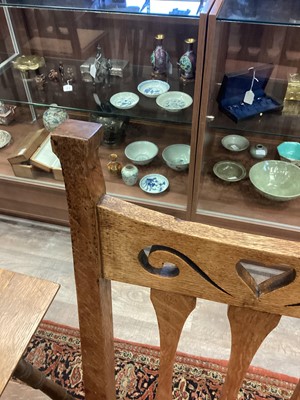 Lot 463 - IN THE MANNER OF C.F.A. VOYSEY, SET OF EIGHT ARTS & CRAFTS OAK DINING CHAIRS