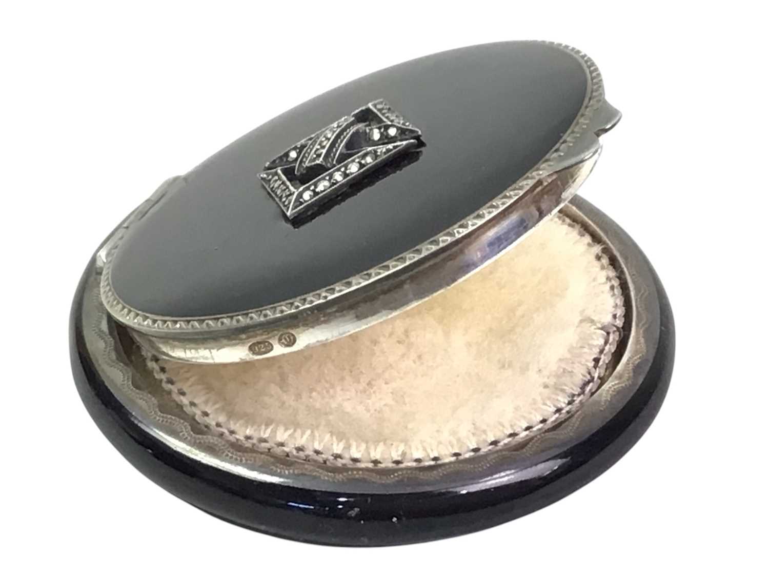 Lot 22 - ART DECO SILVER AND BLACK ENAMEL COMPACT