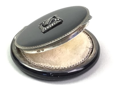 Lot 22 - ART DECO SILVER AND BLACK ENAMEL COMPACT