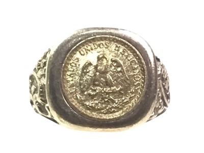 Lot 180 - GOLD COIN INSET SIGNET STYLE RING