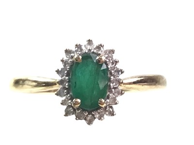 Lot 553 - EMERALD AND DIAMOND CLUSTER RING