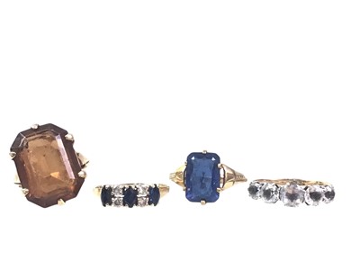 Lot 555 - FOUR GEM SET DRESS RINGS