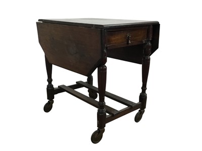 Lot 570 - OAK OVAL DROP LEAF TABLE