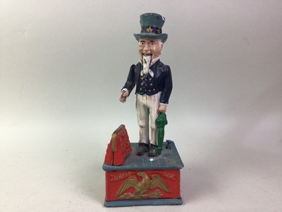 Lot 650 - TWO MECHANICAL CAST IRON MONEY BANKS