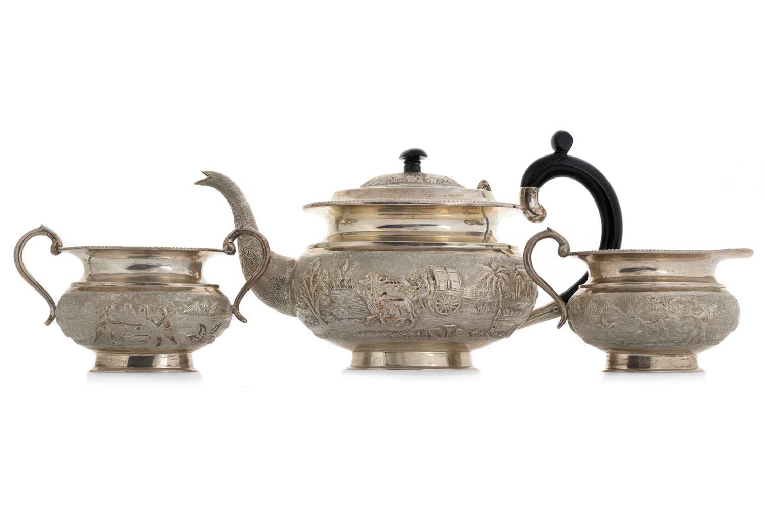 Lot 1366 - INDIAN SILVER THREE PIECE TEA SERVICE