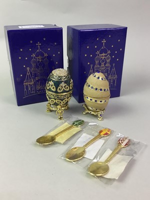 Lot 703 - TWO ATLAS EDITION 'FABERGE' EGGS