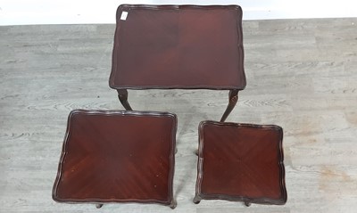 Lot 714 - MAHOGANY NEST OF THREE TABLES
