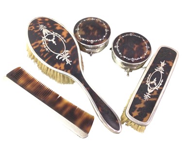 Lot 309 - GEORGE V SILVER AND TORTOISESHELL DRESSING TABLE SET