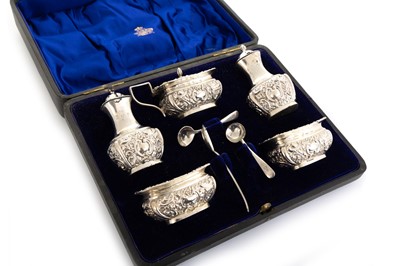 Lot 978 - LATE VICTORIAN SILVER CONDIMENT SET