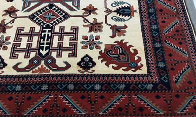 Lot 565 - TURKISH FRINGED RUG