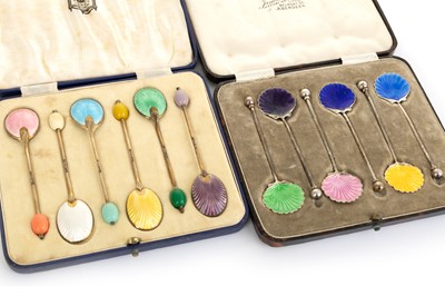 Lot 1008 - TWO SETS OF SILVER AND ENAMEL SPOONS
