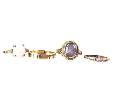 Lot 432 - FOUR GOLD RINGS
