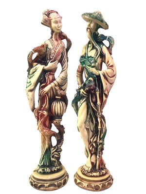 Lot 360 - PAIR OF CHINESE RESIN FIGURES