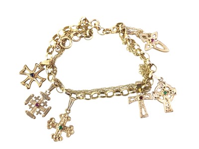 Lot 687 - NINE CARAT GOLD CHARM BRACELET