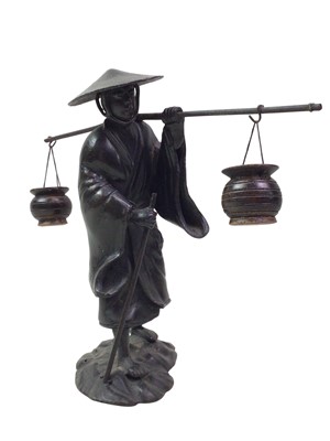 Lot 731 - CAST METAL ASIAN FIGURE