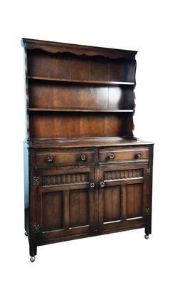 Lot 748 - ERCOL DARK OAK DRESSER