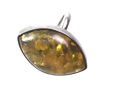 Lot 833 - STERLING SILVER AMBER RING