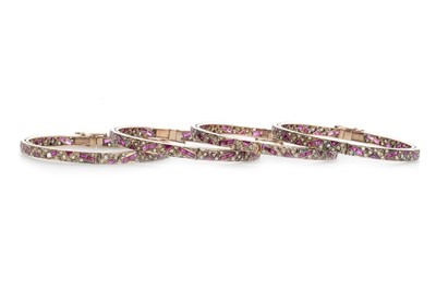 Lot 613 - FOUR VICTORIAN RUBY AND DIAMOND BANGLES