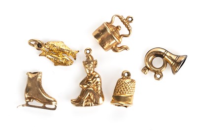 Lot 618 - GROUP OF SIX CHARMS
