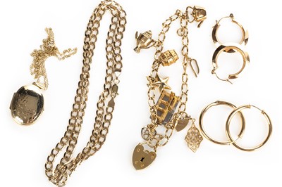 Lot 627 - NINE CARAT GOLD CHARM BRACELET