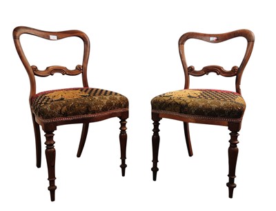 Lot 338 - THREE VICTORIAN ROSEWOOD BALLOON BACK CHAIRS