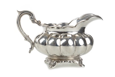 Lot 1074 - GEORGE V SILVER CREAM JUG