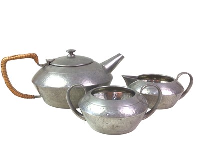Lot 269 - TUDRIC PEWTER THREE PIECE TEA SERVICE