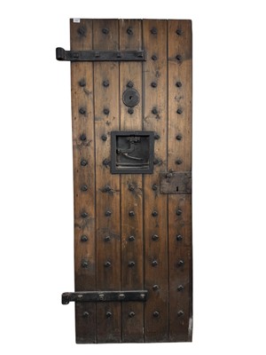 Lot 1899 - SPANISH STUDDED WOODEN CELL DOOR