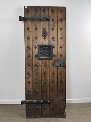 Lot 1899 - SPANISH STUDDED WOODEN CELL DOOR