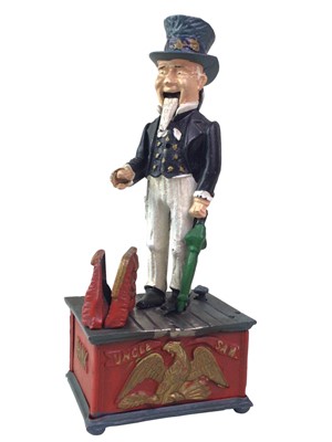 Lot 402 - NOVELTY CAST IRON MONEY BANK