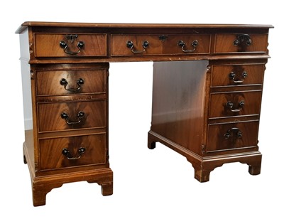 Lot 438 - REPRODUCTION MAHOGANY KNEEHOLE DESK