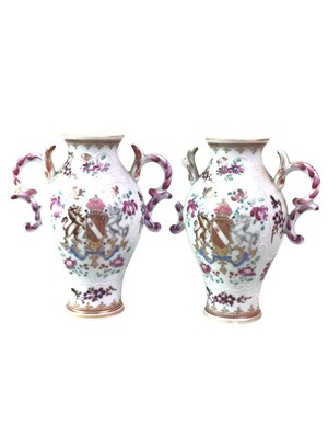 Lot 548 - THREE MINIATURE FOOTED VASES