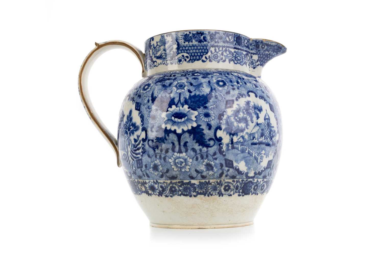 Lot 1254 - STAFFORDSHIRE POTTERY BLUE AND WHITE JUG