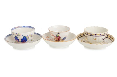 Lot 1271 - THREE TEA BOWL AND SAUCER SETS
