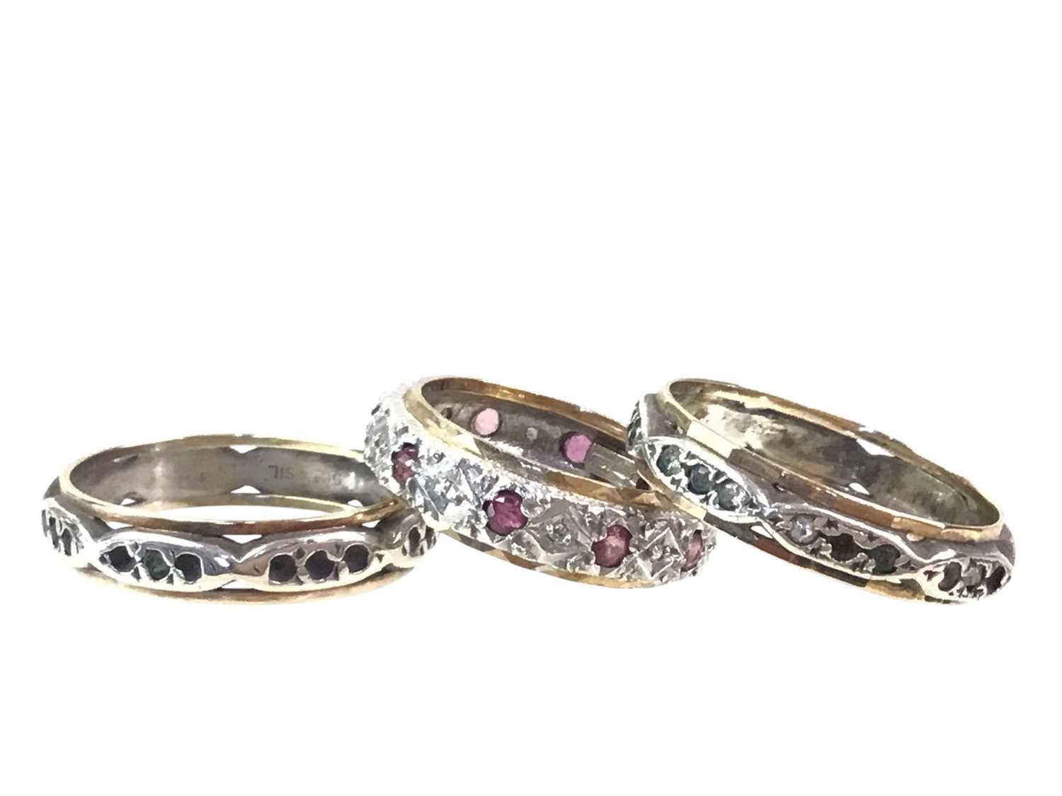 Lot 696 - THREE GEM SET BANDS