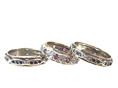 Lot 696 - THREE GEM SET BANDS