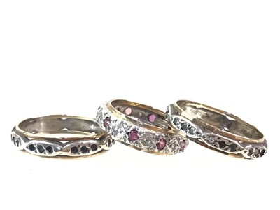 Lot 696 - THREE GEM SET BANDS