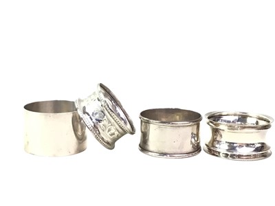 Lot 802 - FOUR SILVER NAPKIN RINGS