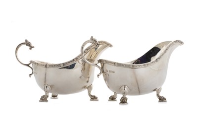 Lot 1119 - PAIR OF ELIZABETH II SILVER CREAM JUGS