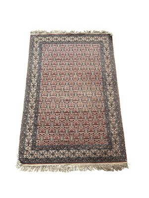 Lot 309 - TWO RUGS