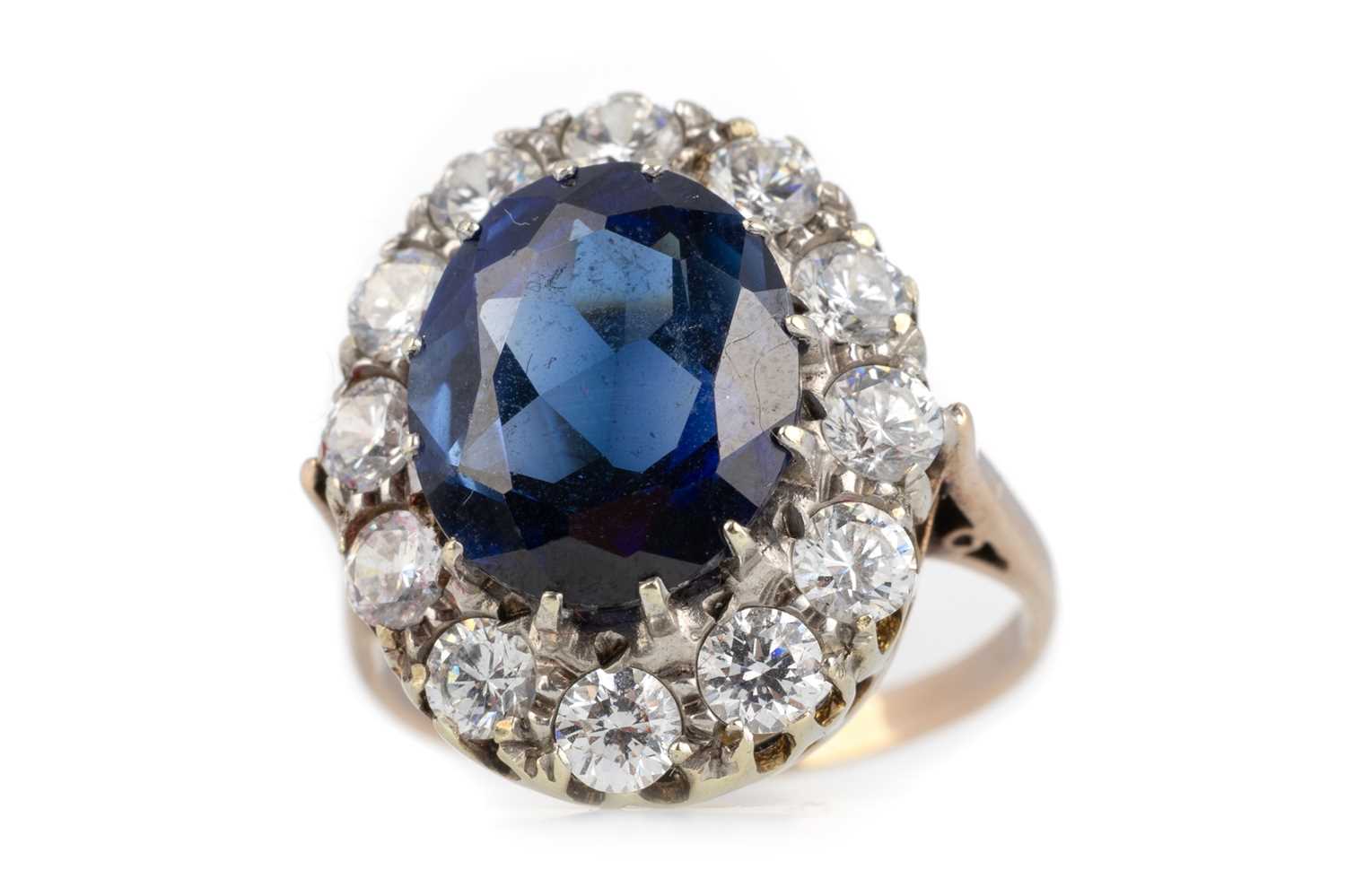 Lot 486 - SAPPHIRE AND CUBIC ZIRCONIA RING