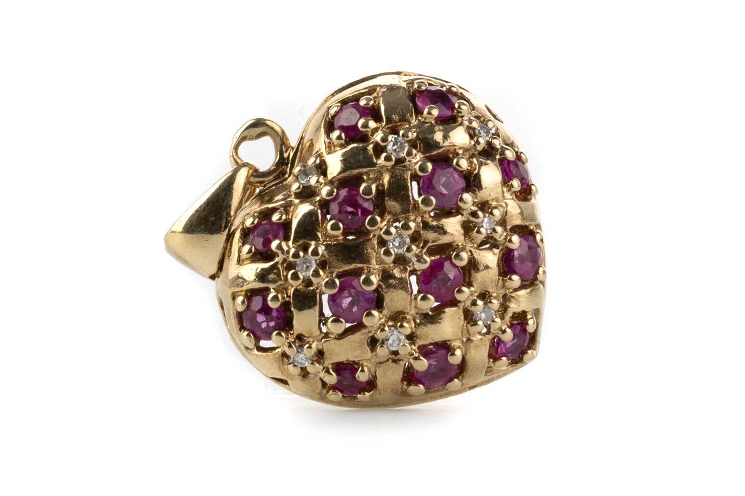 Lot 487 - RUBY AND DIAMOND HEART PENDANT
