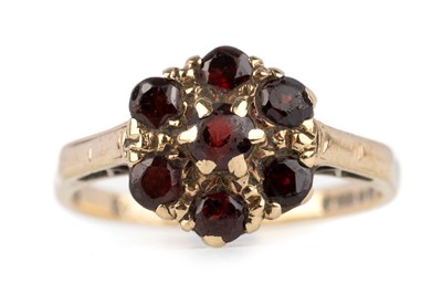 Lot 534 - GARNET CLUSTER RING