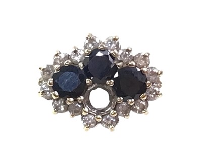 Lot 580 - SAPPHIRE AND CUBIC ZIRCONIA CLUSTER RING