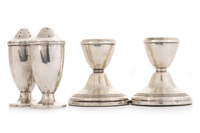 Lot 1141 - PAIR OF ELIZABETH II SILVER CANDLE HOLDERS