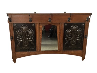 Lot 529 - ART NOUVEAU OAK AND COPPER PANELLED WALL COAT RACK
