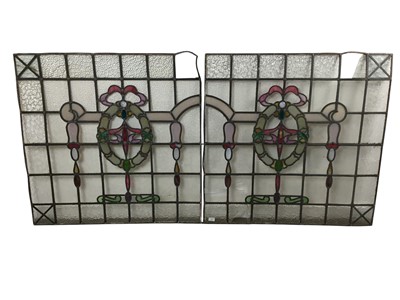 Lot 680 - PAIR OF LEADED AND STAINED GLASS PANELS