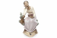 Lot 776 - TWO LLADRO GRES FIGURES OF WOMEN one standing...